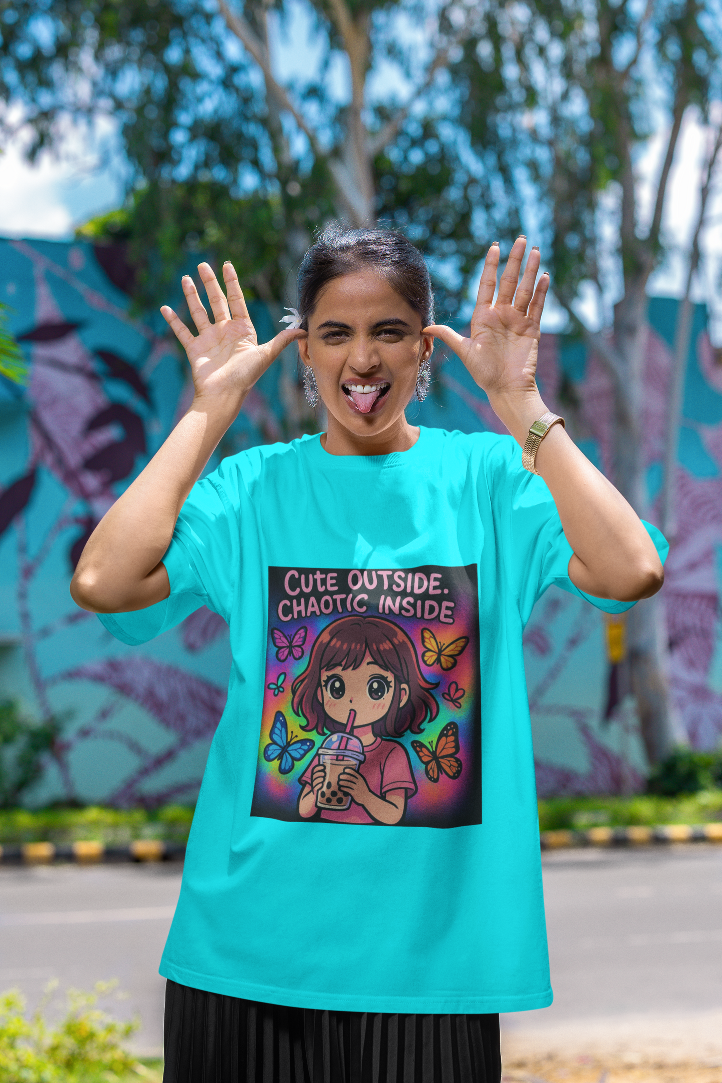 Unleash the dual vibe with the “Cute Outside. Chaotic Inside” Graphic T-Shirt —Rakhi Drop Limited Edition.