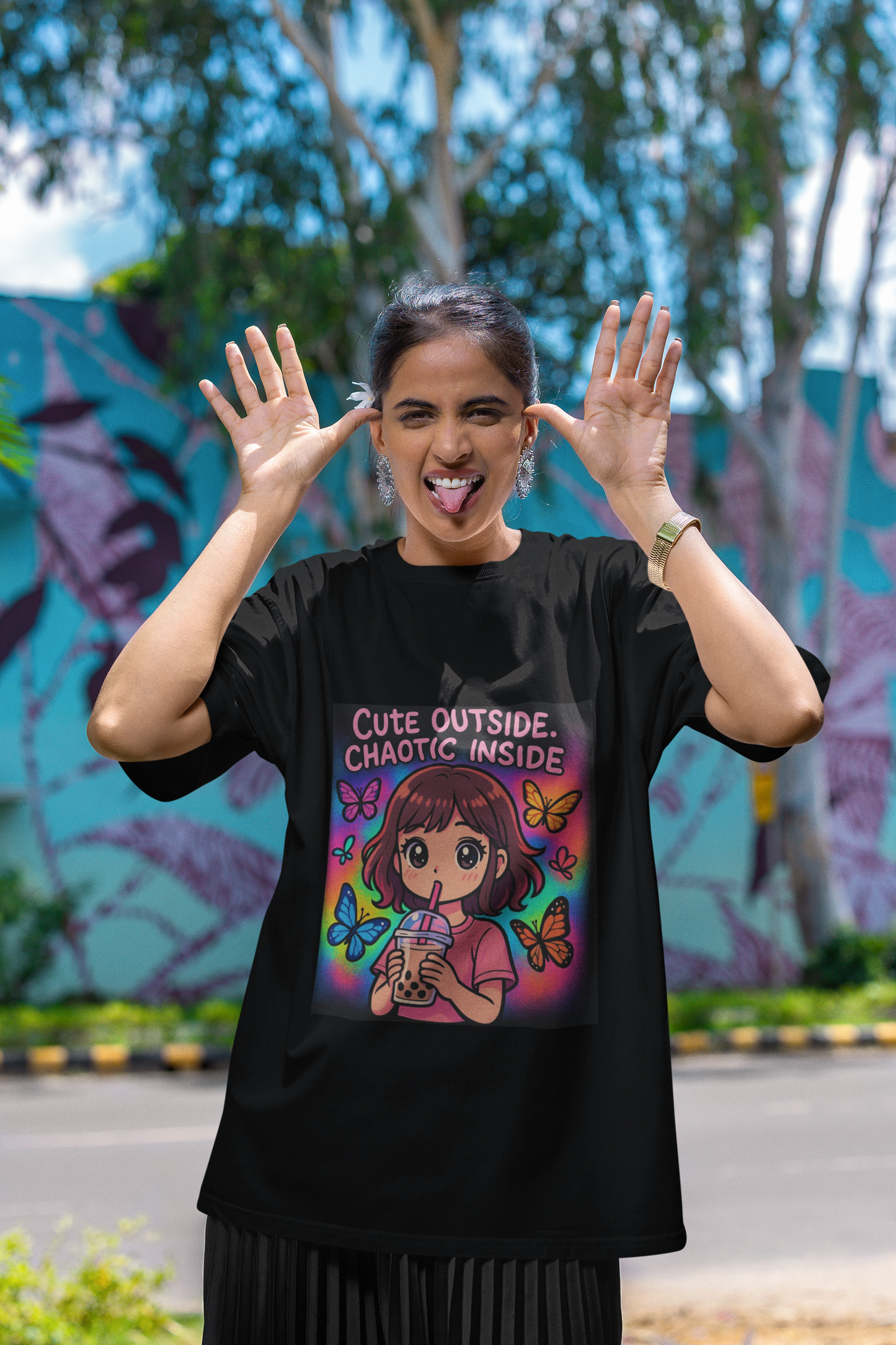 Unleash the dual vibe with the “Cute Outside. Chaotic Inside” Graphic T-Shirt —Rakhi Drop Limited Edition.