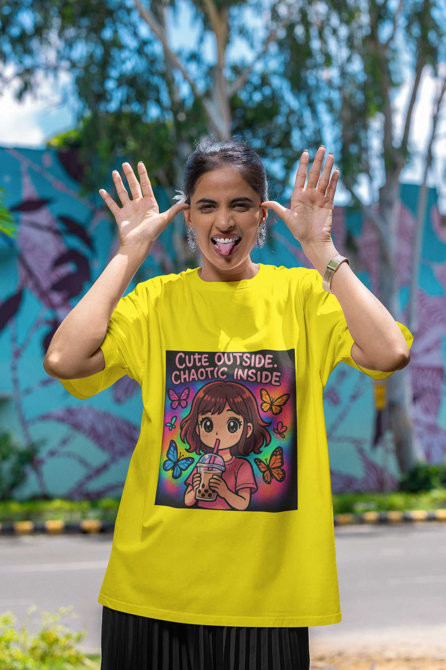 Unleash the dual vibe with the “Cute Outside. Chaotic Inside” Graphic T-Shirt —Rakhi Drop Limited Edition.