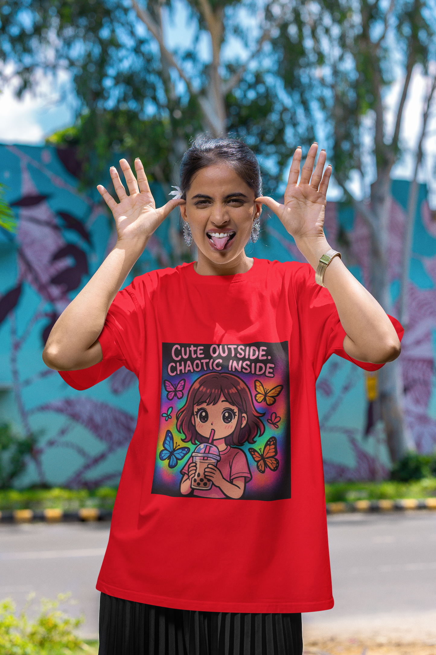 Unleash the dual vibe with the “Cute Outside. Chaotic Inside” Graphic T-Shirt —Rakhi Drop Limited Edition.