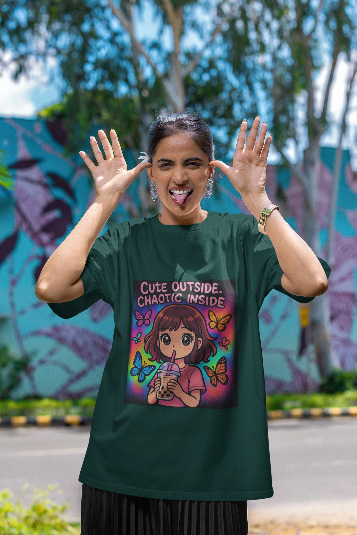 Unleash the dual vibe with the “Cute Outside. Chaotic Inside” Graphic T-Shirt —Rakhi Drop Limited Edition.